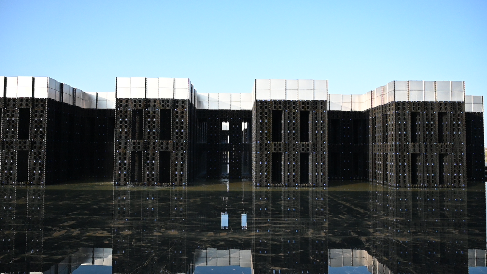 Wide angle view of the evaporative matrix sitting in shallow water