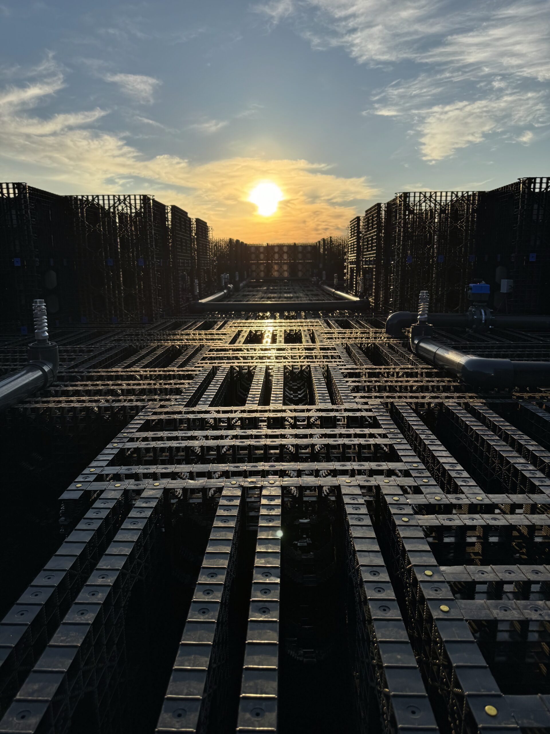 top view of evaporative matrix with sun setting in the background
