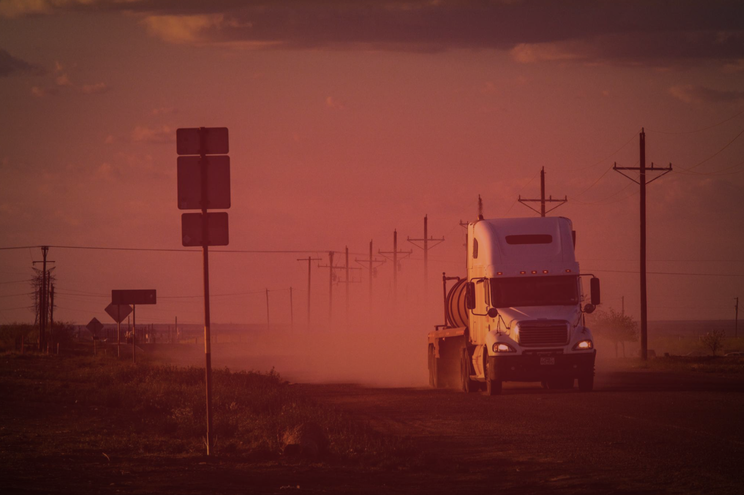 A large truck transporting equipement.