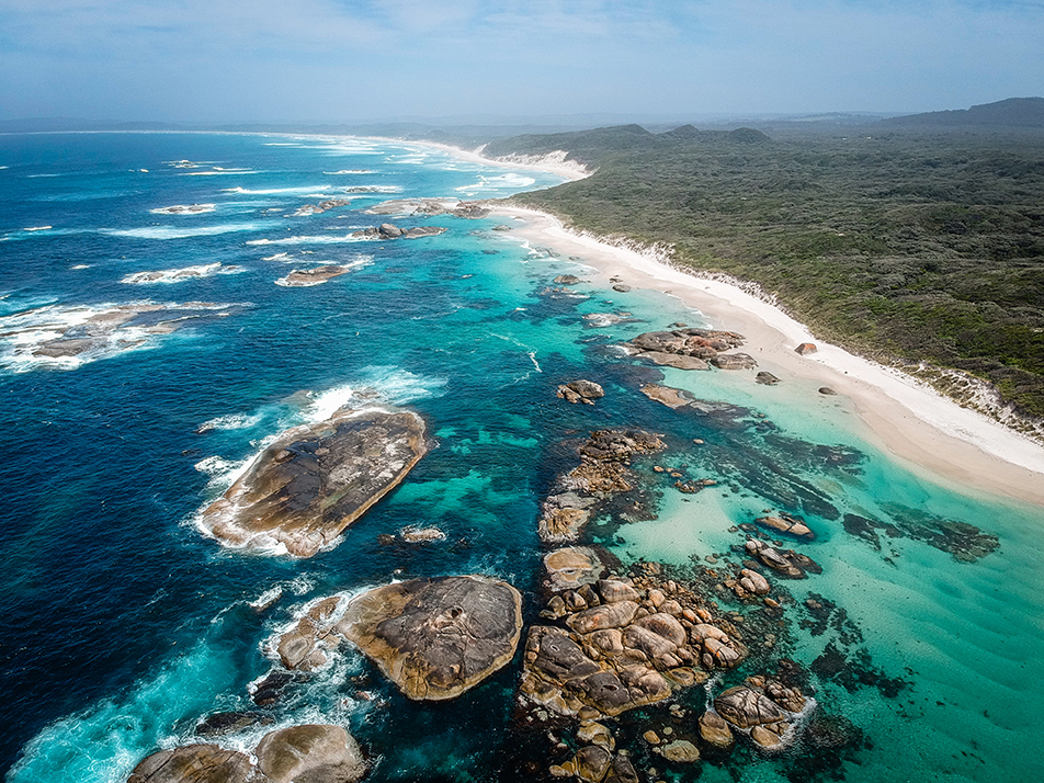 blue and clear water at a coastline